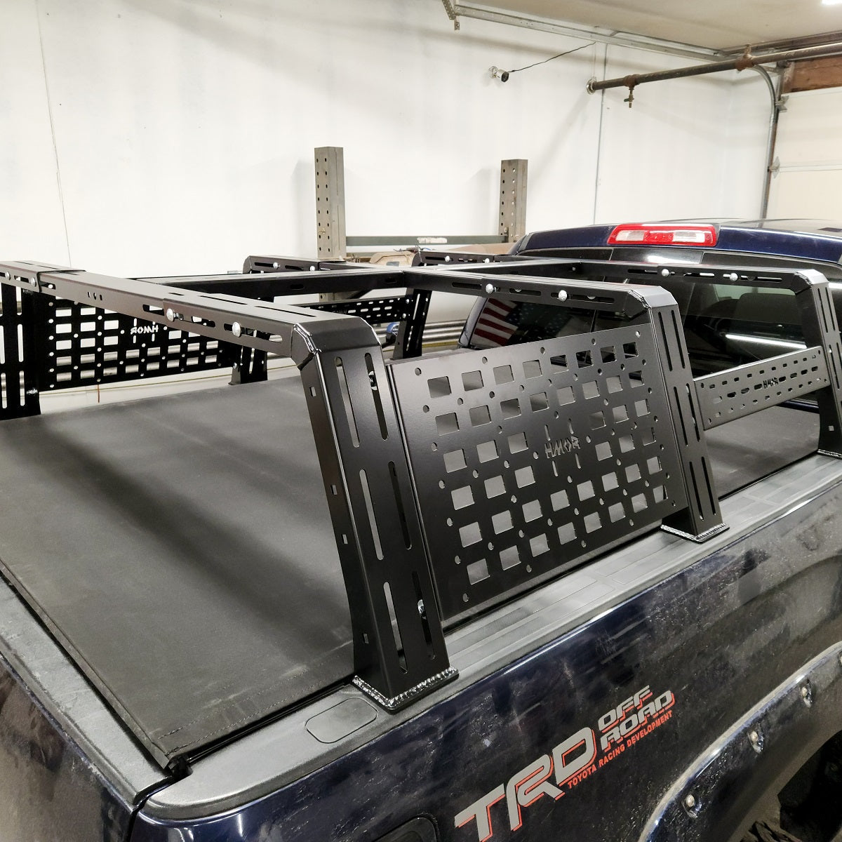2007-2026 Toyota Tundra ROCK-IT Rack installed with MOLLE side panels, rear three-quarter view HMOR