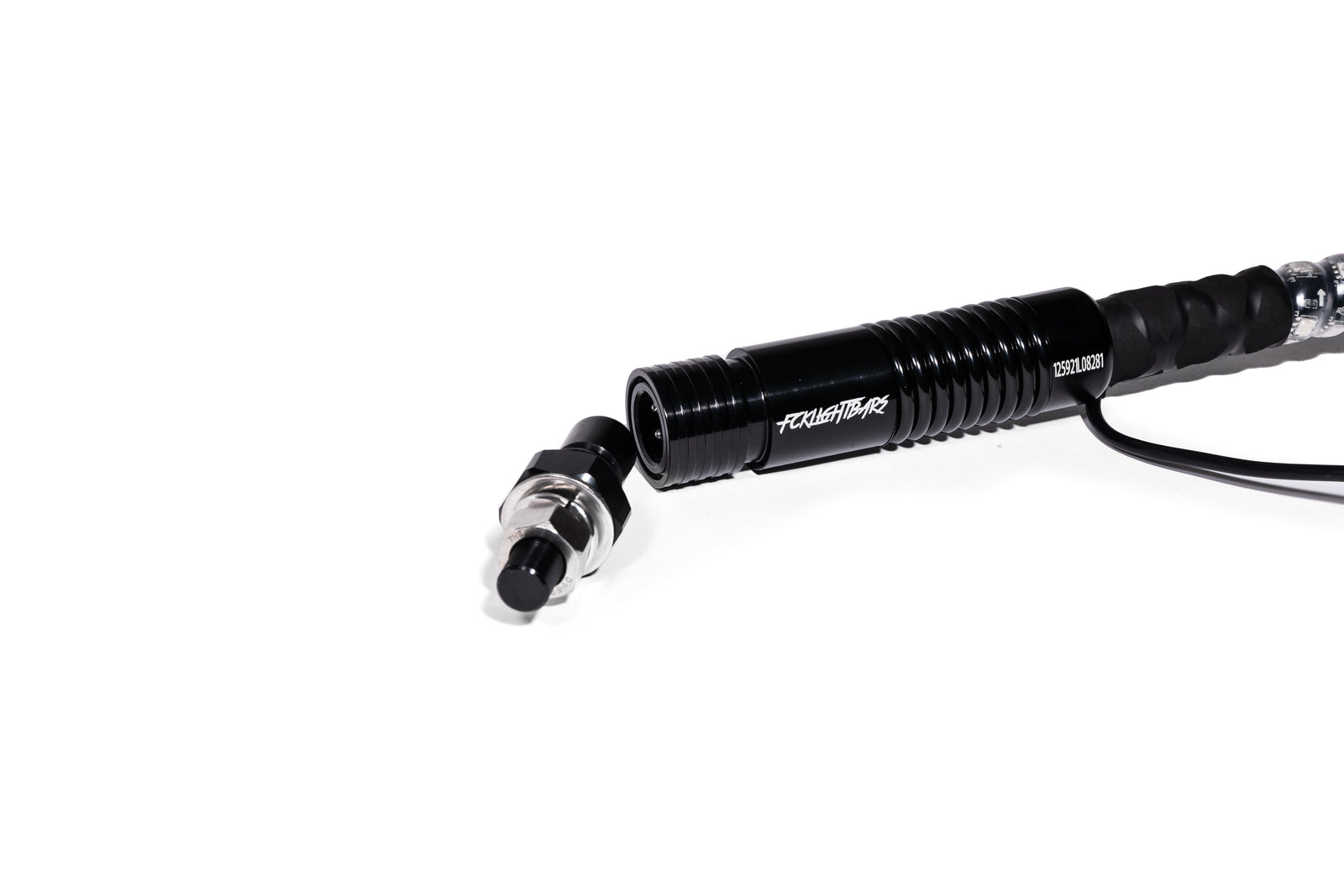 Close view of the LED whip's black controller and cable connector