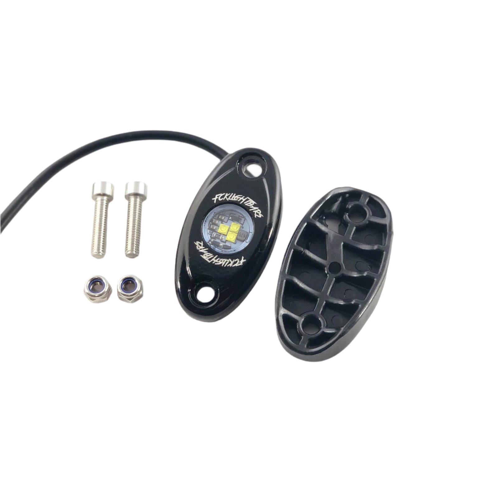 Low-profile rock light pod with mounting screws and housing