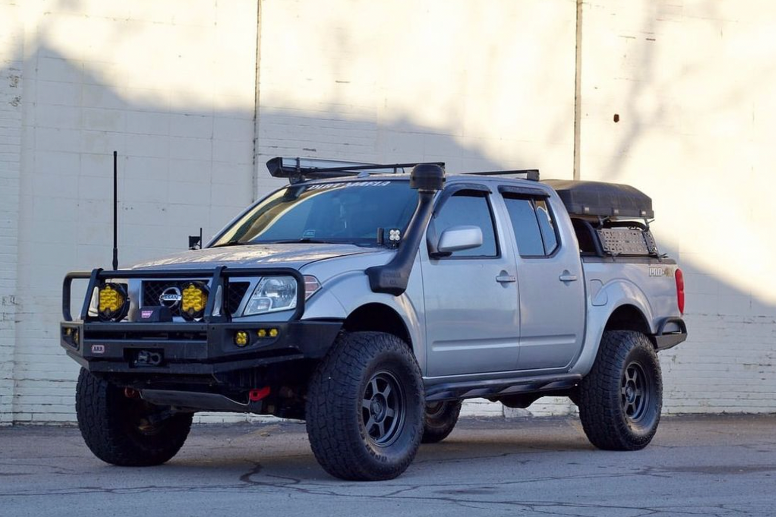 Unleashing the Power of Heavy Metal Offroad's "ROCK-IT" Overlanding Rack System: A Winch-Equipped Adventure