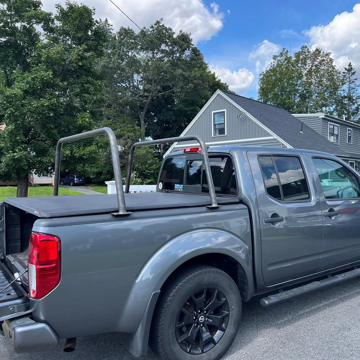 Silver pickup fitted with low Heavy Metal Off-Road Bed Bars